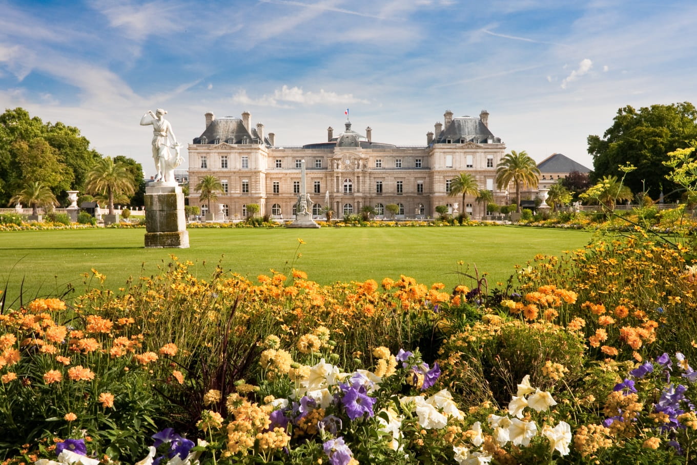 The Luxembourg Garden and Palace, with its beautiful green lawns and numerous statues