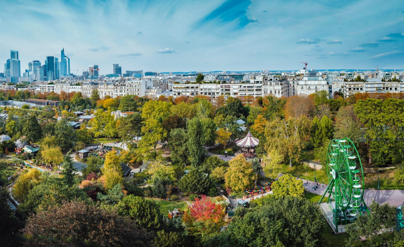 Sky view of the Bois de Boulogne and the Jardin d'Acclimatation with, in the background, the La Défense district - ©Sylvain Bachelot 