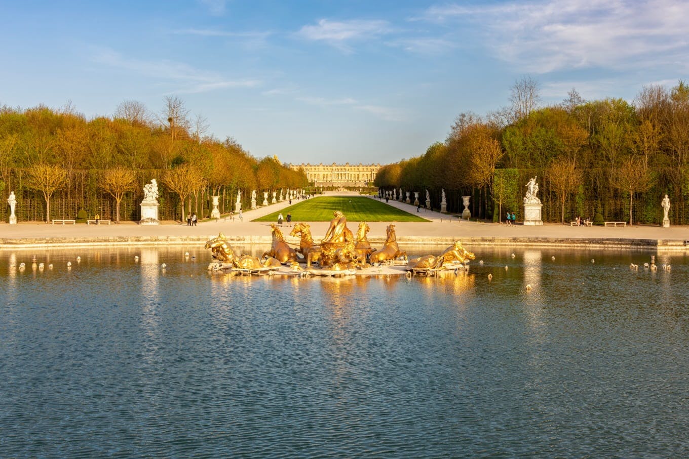 The Appolon fountain in the gardens of the Palace of Versailles with, in the background, the palace